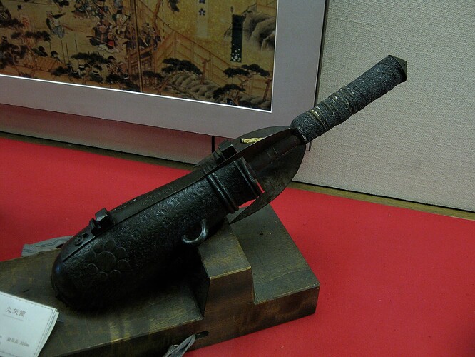 Antique_Japanese_bohiya_or_bo_hiya_fire_arrow_and_hiya_taihou_(fire_arrow_cannon)